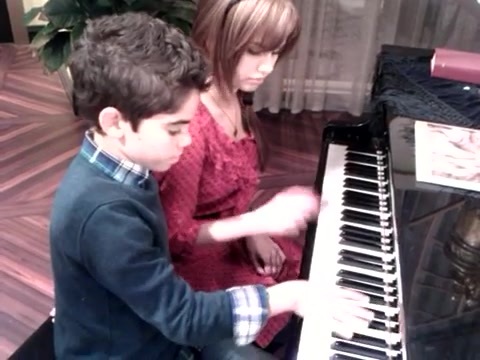 Debby Ryan gives Cameron a quick piano lesson 105
