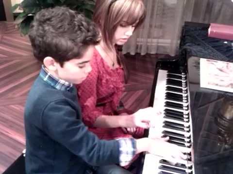 Debby Ryan gives Cameron a quick piano lesson 110
