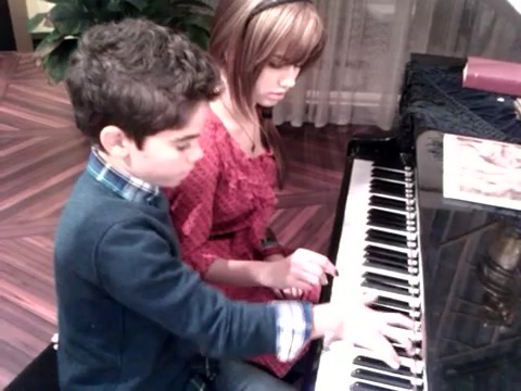 Debby Ryan gives Cameron a quick piano lesson 118