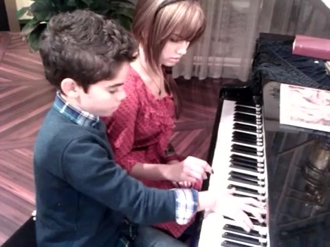Debby Ryan gives Cameron a quick piano lesson 119
