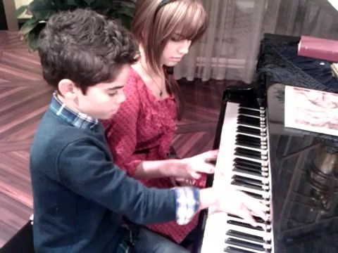 Debby Ryan gives Cameron a quick piano lesson 125