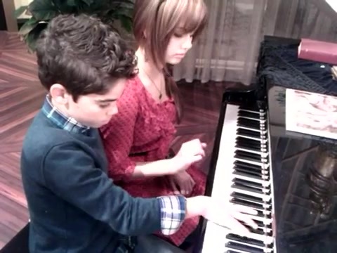 Debby Ryan gives Cameron a quick piano lesson 136