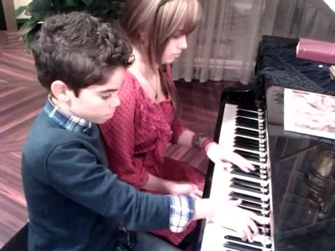 Debby Ryan gives Cameron a quick piano lesson 144