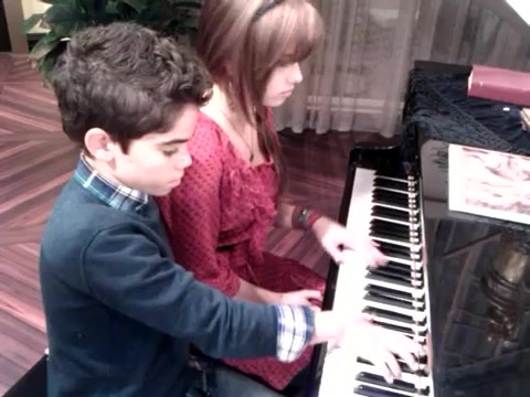 Debby Ryan gives Cameron a quick piano lesson 148