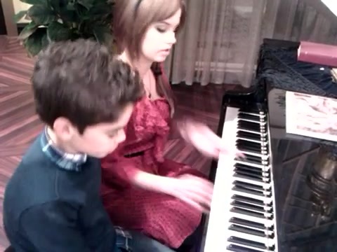 Debby Ryan gives Cameron a quick piano lesson 154