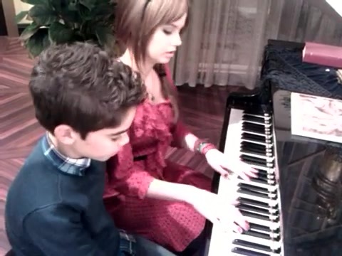 Debby Ryan gives Cameron a quick piano lesson 155