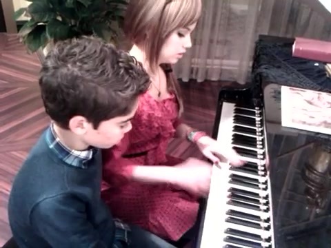 Debby Ryan gives Cameron a quick piano lesson 158