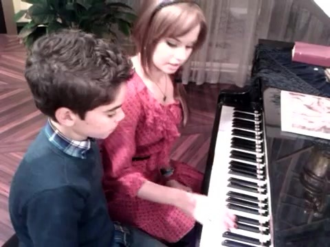 Debby Ryan gives Cameron a quick piano lesson 163