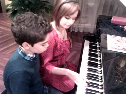 Debby Ryan gives Cameron a quick piano lesson 164