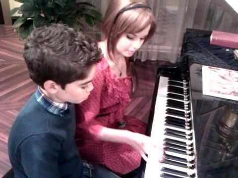 Debby Ryan gives Cameron a quick piano lesson 165