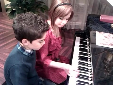 Debby Ryan gives Cameron a quick piano lesson 167