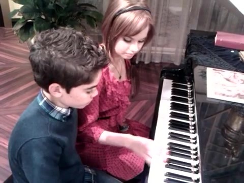 Debby Ryan gives Cameron a quick piano lesson 169