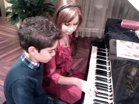 Debby Ryan gives Cameron a quick piano lesson 173