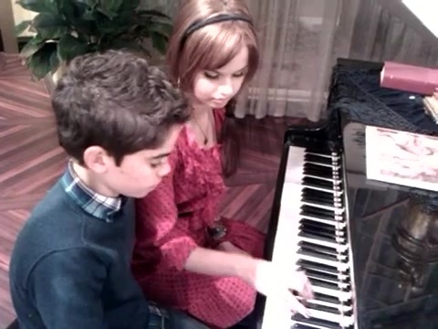 Debby Ryan gives Cameron a quick piano lesson 174