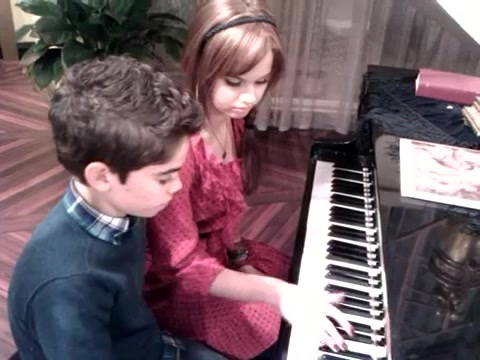 Debby Ryan gives Cameron a quick piano lesson 175