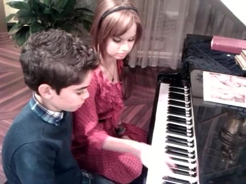 Debby Ryan gives Cameron a quick piano lesson 177