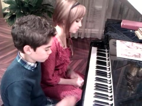 Debby Ryan gives Cameron a quick piano lesson 180