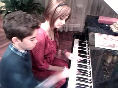 Debby Ryan gives Cameron a quick piano lesson 183