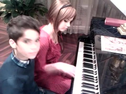 Debby Ryan gives Cameron a quick piano lesson 185