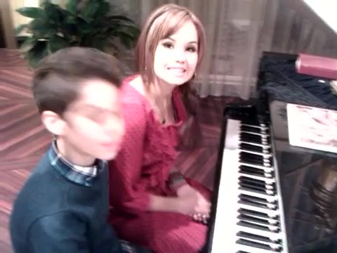 Debby Ryan gives Cameron a quick piano lesson 188