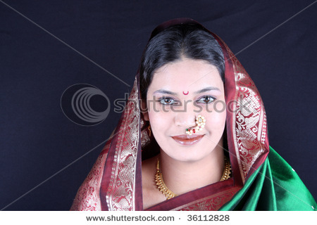 stock-photo-a-portrait-of-a-beautiful-indian-woman-of-marathi-culture-in-a-traditional-green-sari-36