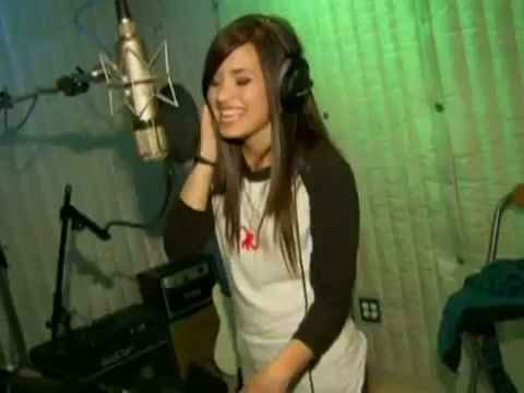 Demi in the recording studio. 564