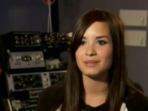 Demi in the recording studio. 711