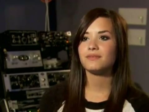 Demi in the recording studio. 257