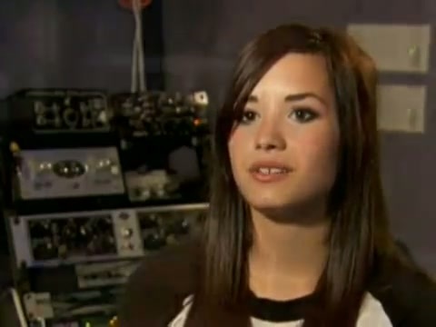 Demi in the recording studio. 265