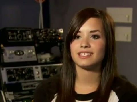 Demi in the recording studio. 293