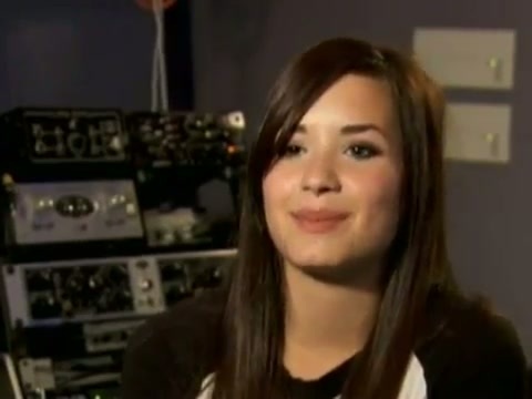 Demi in the recording studio. 303