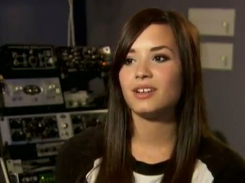 Demi in the recording studio. 389