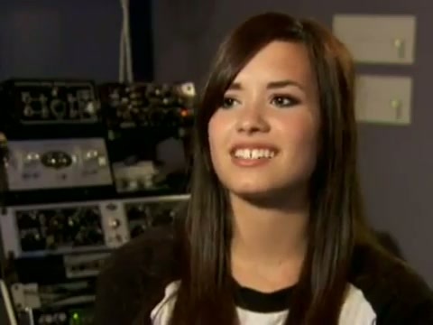 Demi in the recording studio. 400