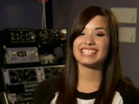 Demi in the recording studio. 497