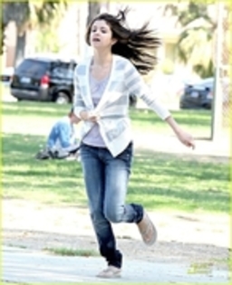  - playing baseball game at a local park in LA