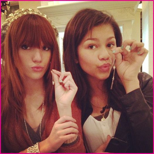 Bella-Thorne-And-Zendaya-Coleman-Mickey-Mouse-Necklaces - BELLA THORNE NICE