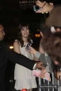 35978604_GSWKVWDIS - Demitzu - NOVEMBER 17TH - Signs autograpghs as she leaves the Twilight Premiere