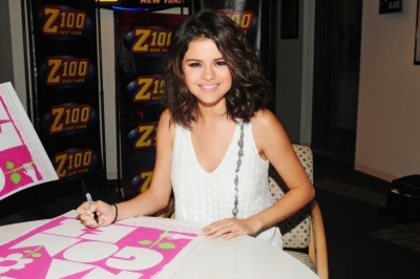 normal_23708_celebrity_paradise_com_TheElder_SelenaGomez2010_029_22_StopsbyZ1004_122_155lo - 22 September - Z100