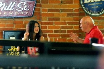 normal_37264_Preppie_Selena_Gomez_and_Justin_Bieber_share_a_kiss_at_a_bar_in_his_hometown_of_Stratfo - 03 July - At a bar in Stratford Canada