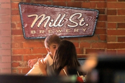 normal_38883_Preppie_Selena_Gomez_and_Justin_Bieber_share_a_kiss_at_a_bar_in_his_hometown_of_Stratfo - 03 July - At a bar in Stratford Canada