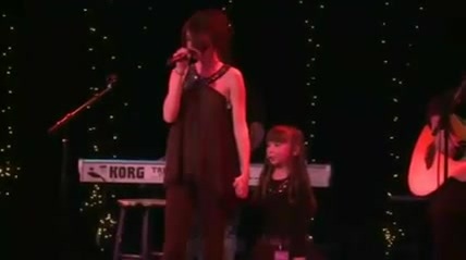Selena Gomez  of UNICEF 120 - Selena Gomez and The Scene - singing of UNICEF