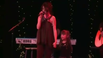 Selena Gomez  of UNICEF 122 - Selena Gomez and The Scene - singing of UNICEF