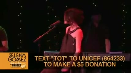 Selena Gomez  of UNICEF 497 - Selena Gomez and The Scene - singing of UNICEF