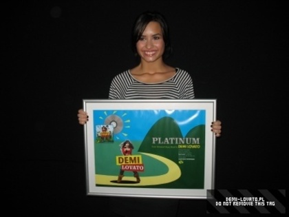 Demi (5) - Demitzu - 23 05 2009 - Recieves a Disco De Platino for Camp Rock in Rio De Janeiro Brasil