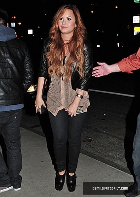 Demi (4) - Demitzu - 08 03 2012 - Heads to an office building in New York City