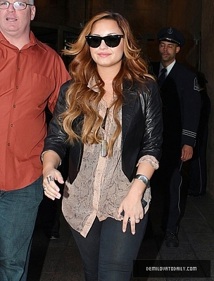 Demi (15) - Demitzu - 08 03 2012 - Leaves her hotel in New York City