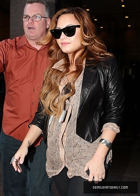 Demi (19) - Demitzu - 08 03 2012 - Leaves her hotel in New York City