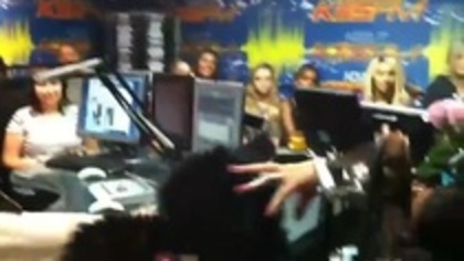 Demi on Kiss FM rocking her new hat (2)