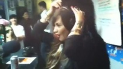 Demi on Kiss FM rocking her new hat (7)