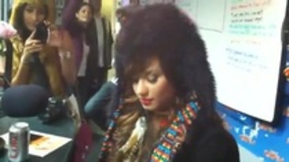 Demi on Kiss FM rocking her new hat (28)